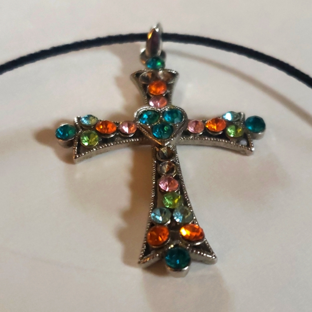 Beautiful cross pendant and black rope necklace